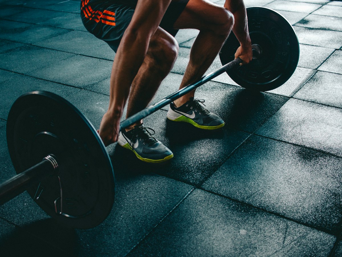 Person about to lift a barbell