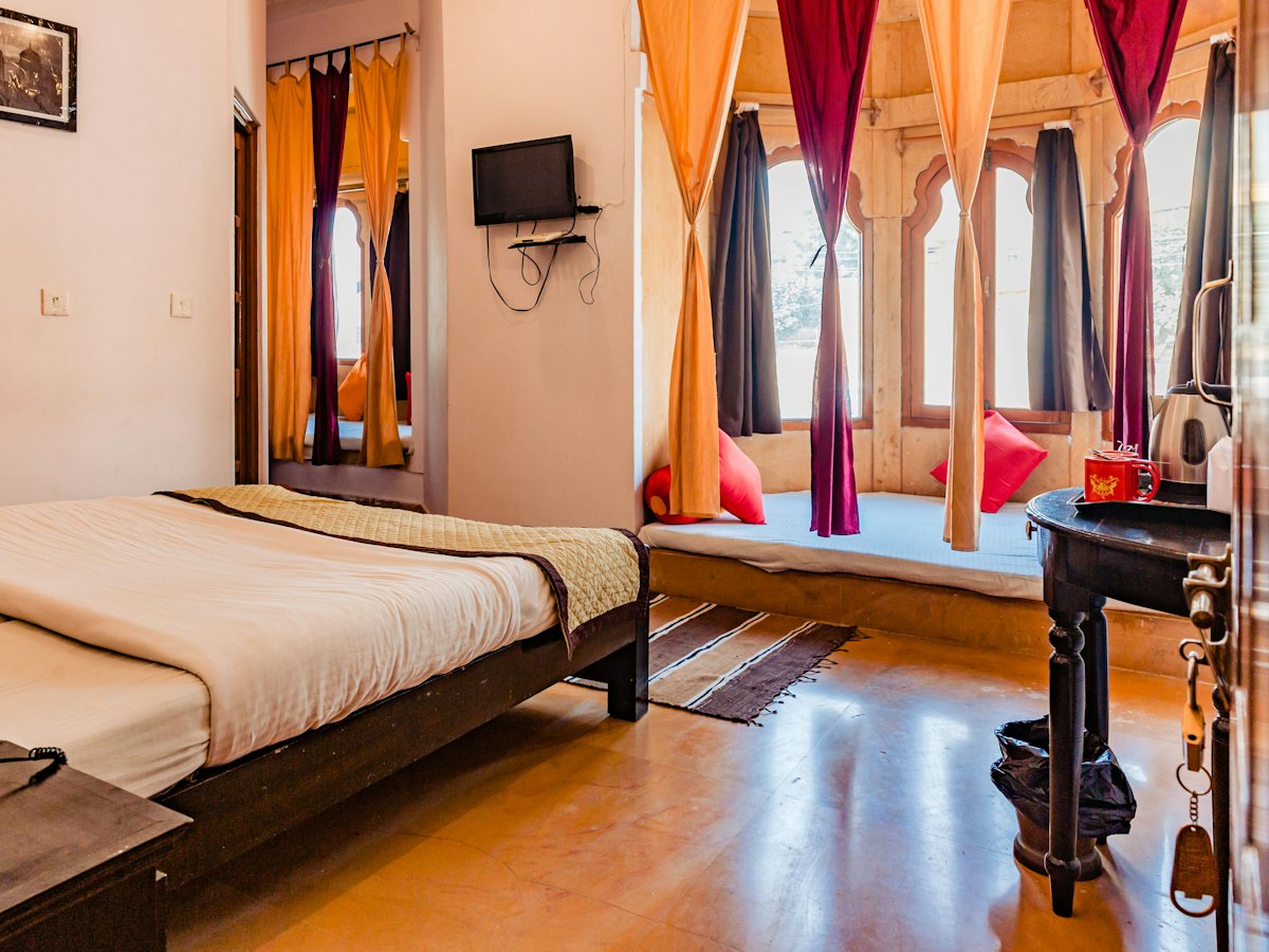 Hotel bedroom with a TV