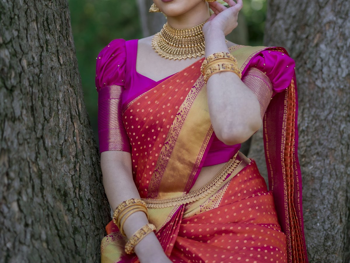 Woman in a sari with gold jewellery