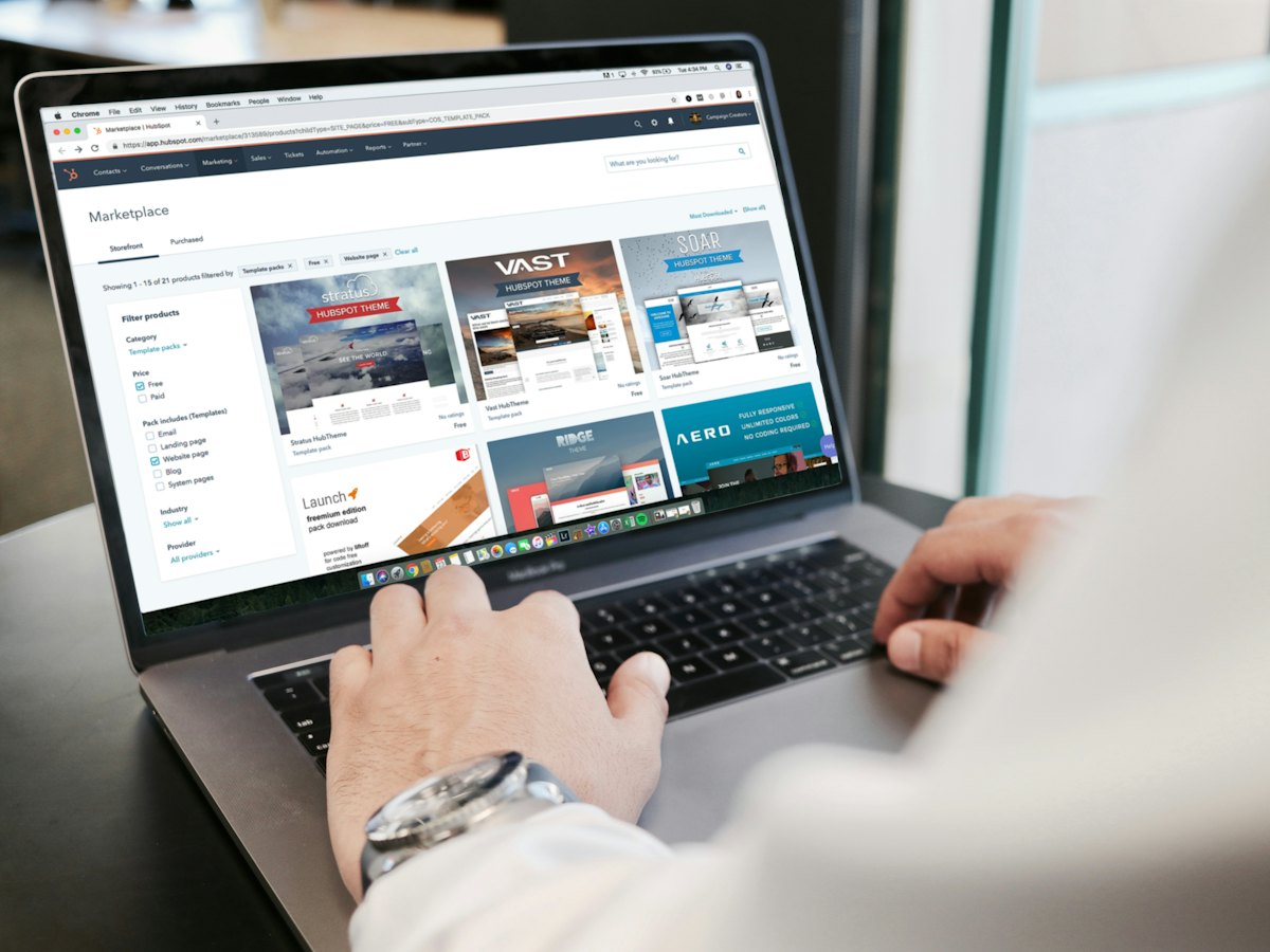 Person browsing a web page on a laptop
