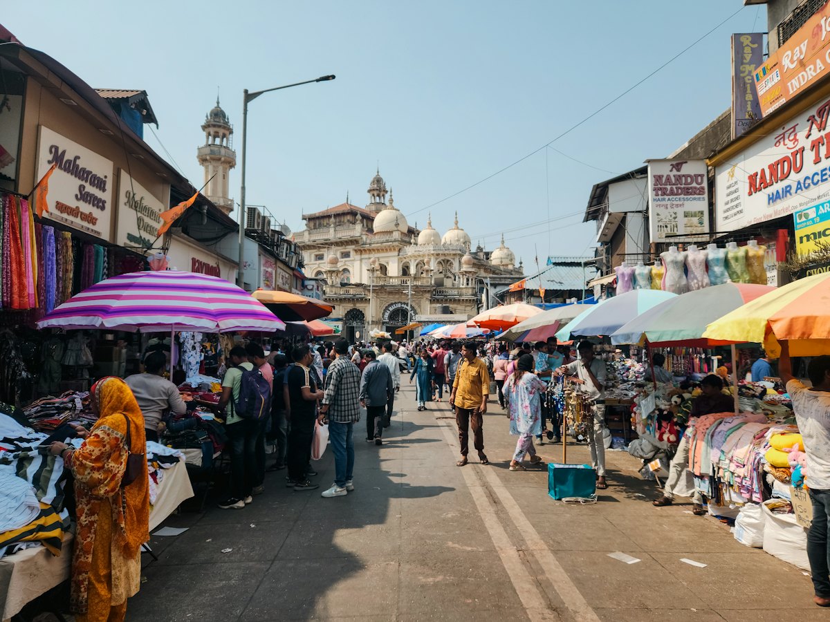 Busy market street with shops